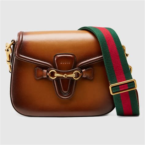 gucci 900 posti|gucci leather shoulder bag.